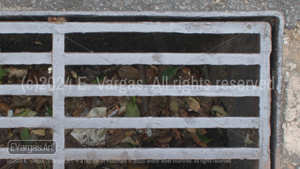 close-up of metal grid on the ground, street drainage, asphalt, metal, day, outdoors