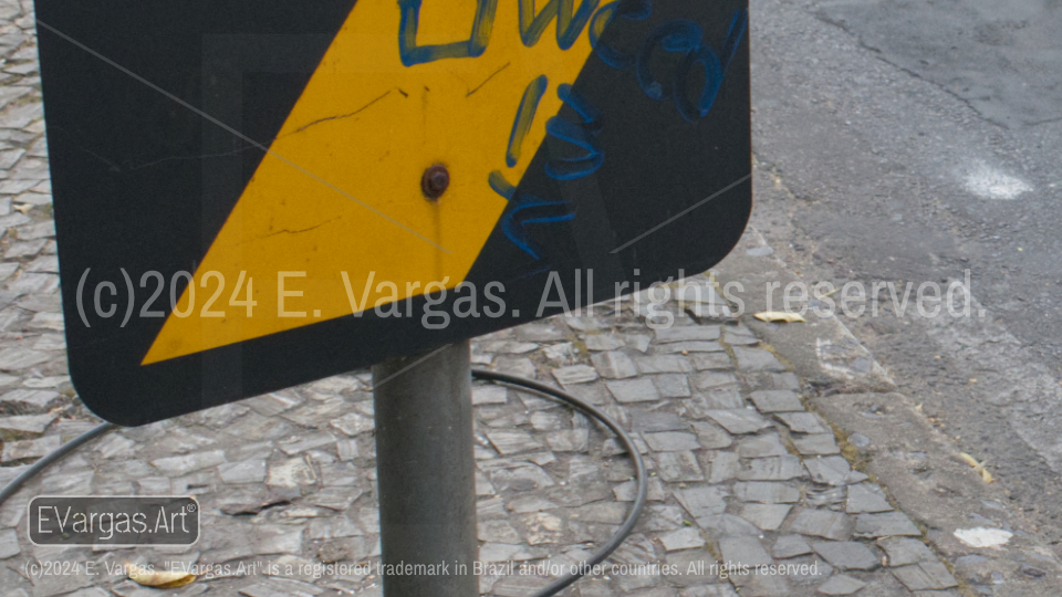 black and yellow metal street sign, street, sidewalk, urban, city, cables on the ground, day, sunlight, outdoors, day