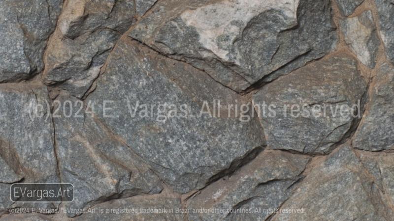 close-up of rocks on a wall, street, outdoors, daylight, zoom