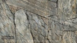 close-up of rocks on a wall, street, outdoors, daylight, zoom