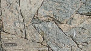 close-up of rocks on a wall, street, outdoors, daylight, zoom